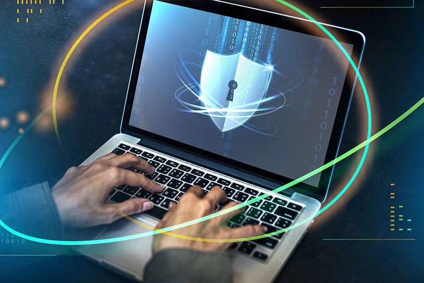 An illustration of security is presented with a huge icon on the laptop.